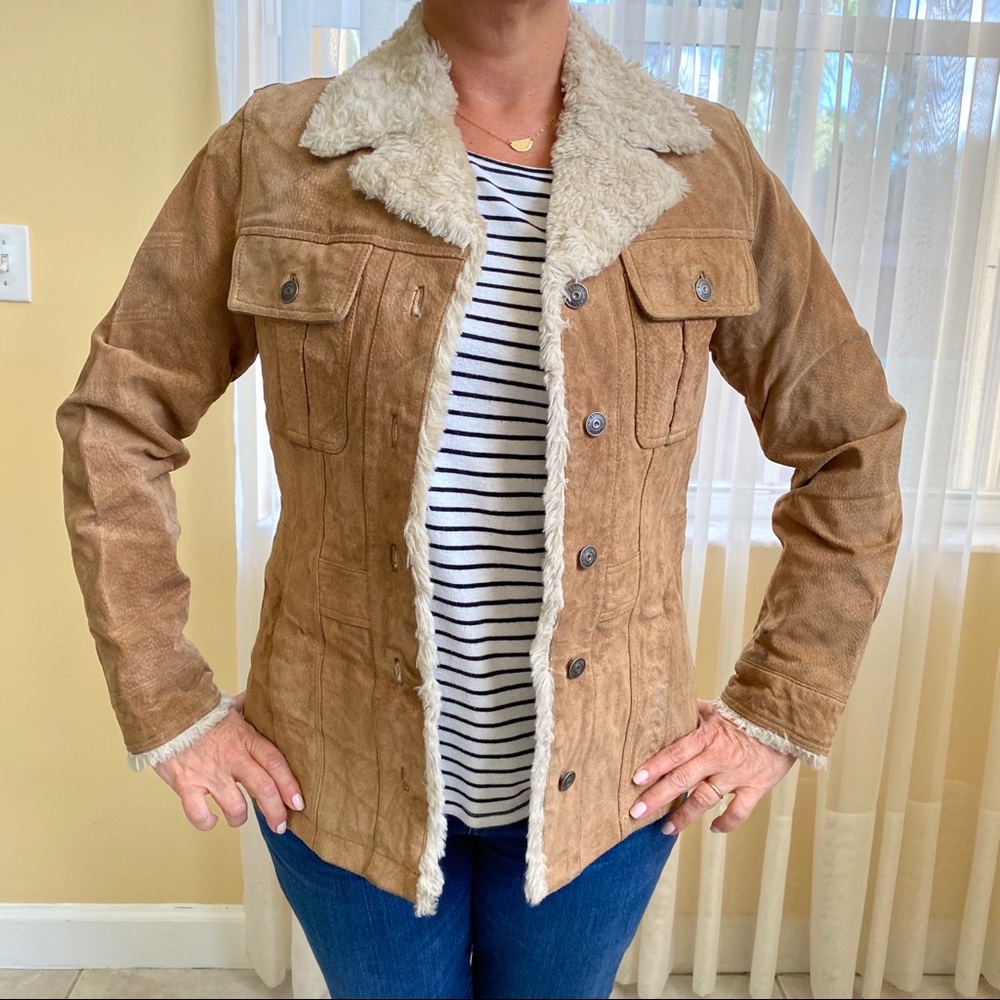 Leather jacket with fur trim